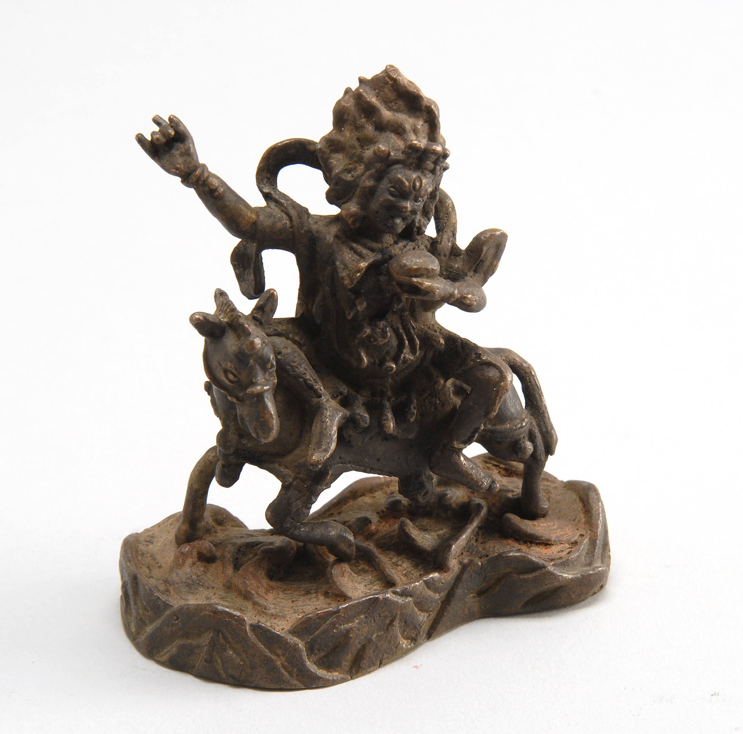 Appraisal: BRONZE FIGURE OF MALAKALA Seated on horseback wearing a skull