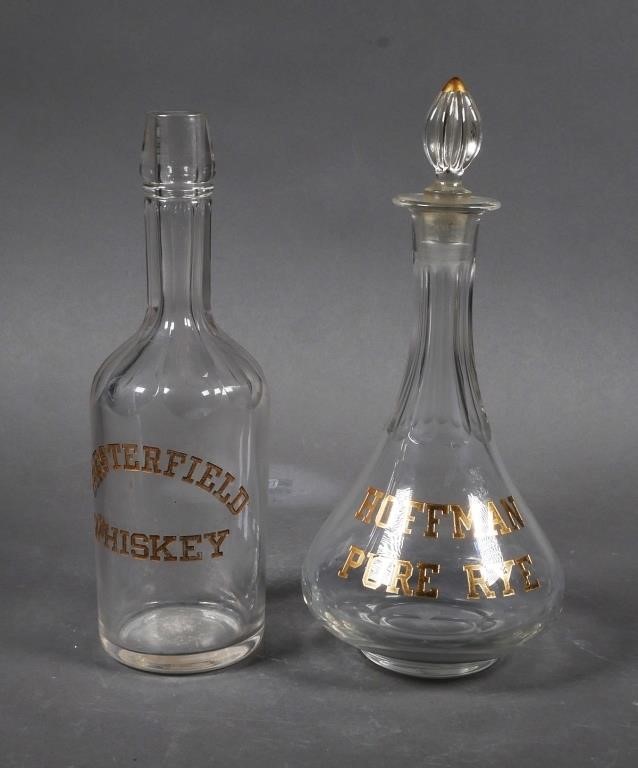 Appraisal: antique whiskey bottles Decanter with stopper marked with etched gold