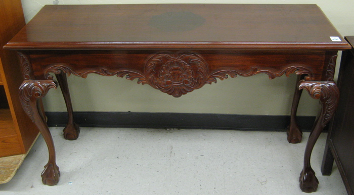 Appraisal: CHIPPENDALE STYLE MAHOGANY SOFA TABLE having long rectangular top over