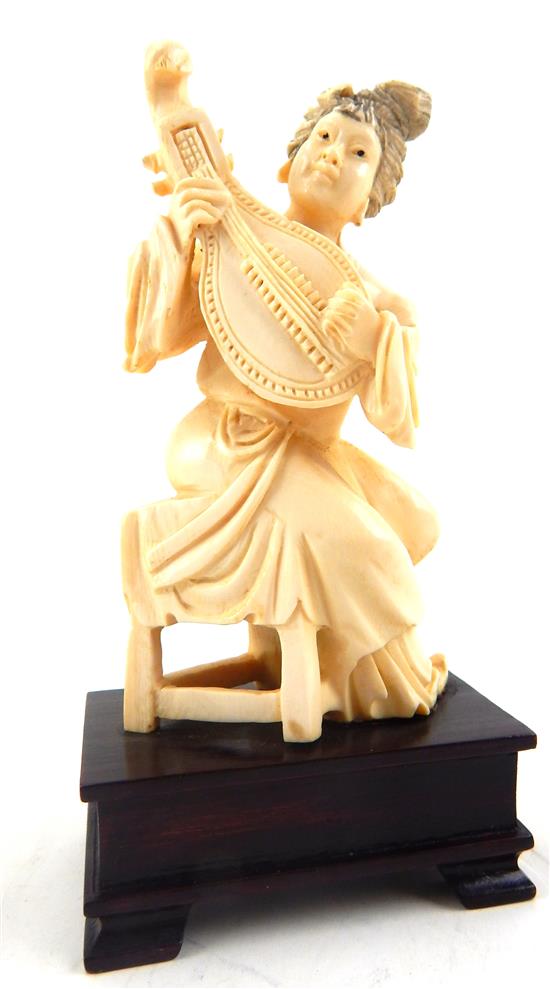 Appraisal: ASIAN th C Asian carved ivory figure depicting seated female