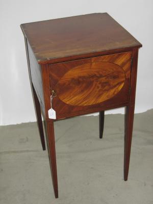 Appraisal: A GEORGE III MAHOGANY POT CUPBOARD of square form with