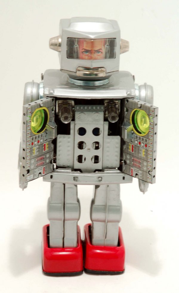 Appraisal: A tin battery operated Attacking Martian robot action toy Silver