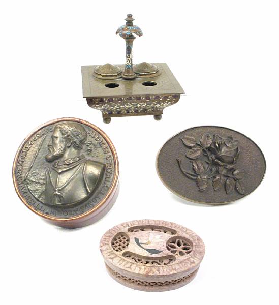 Appraisal: A group of table items comprising an inkwell a bronze