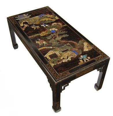 Appraisal: A Chinese lacquer and ebonised coffee table the inset panel