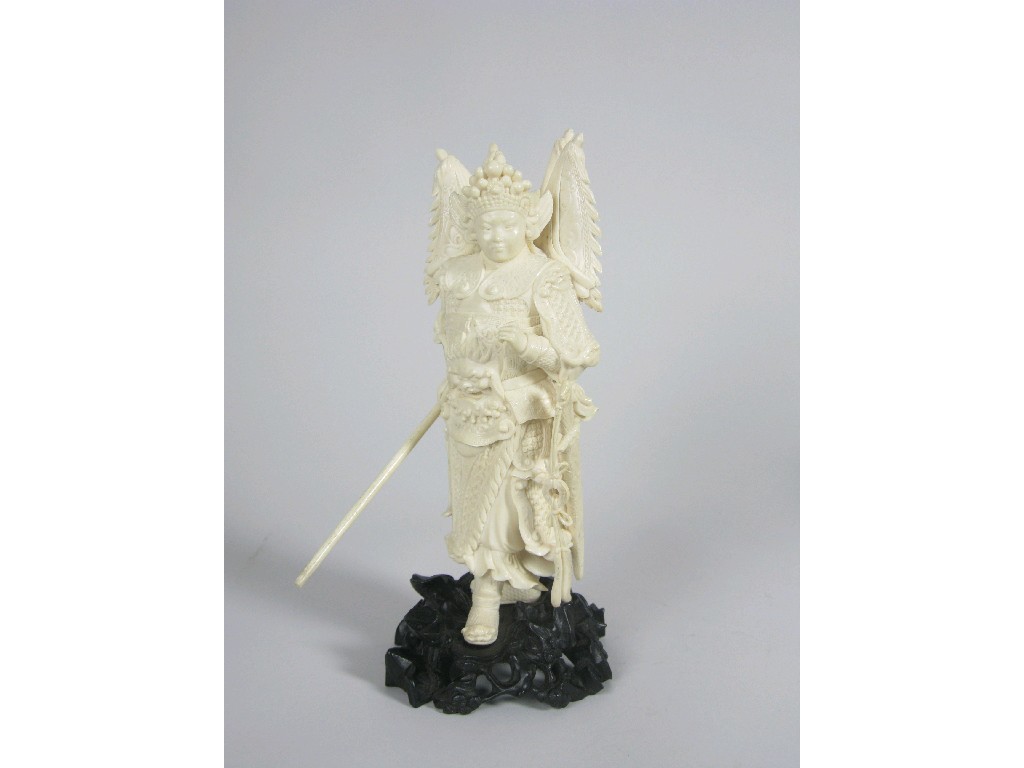 Appraisal: An Oriental carved ivory Standing Figure of warrior holding staff