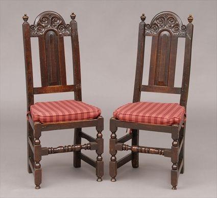 Appraisal: PAIR OF JACOBEAN CARVED OAK SIDE CHAIRS Each breakarch s-scroll