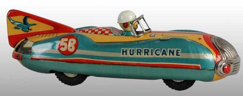 Appraisal: Tin Hurricane Race Car Friction Toy Description Japanese Working but