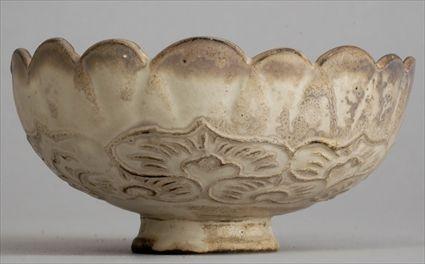 Appraisal: SUNG PORCELAIN FOOTED BOWL The lobed bowl with relief stylized