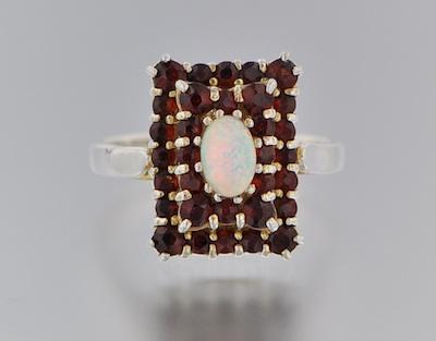 Appraisal: A Ladies' Opal and Garnet Ring Sterling silver ring set