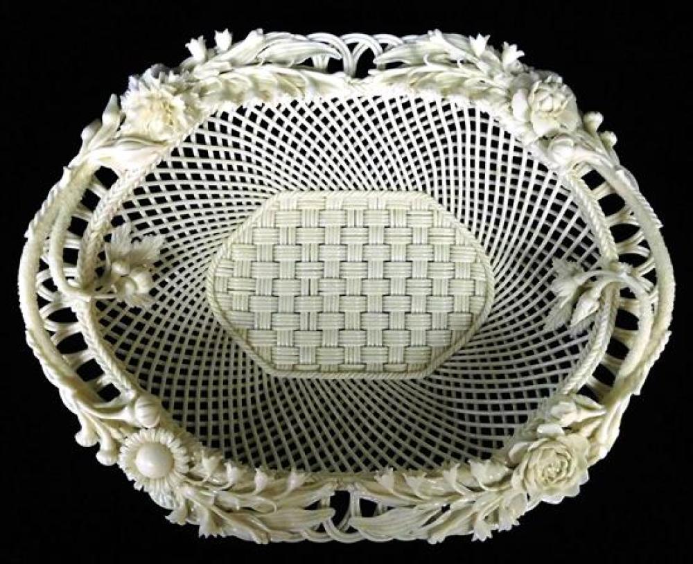 Appraisal: Belleek open lattice basket two handles flowers to rim basket