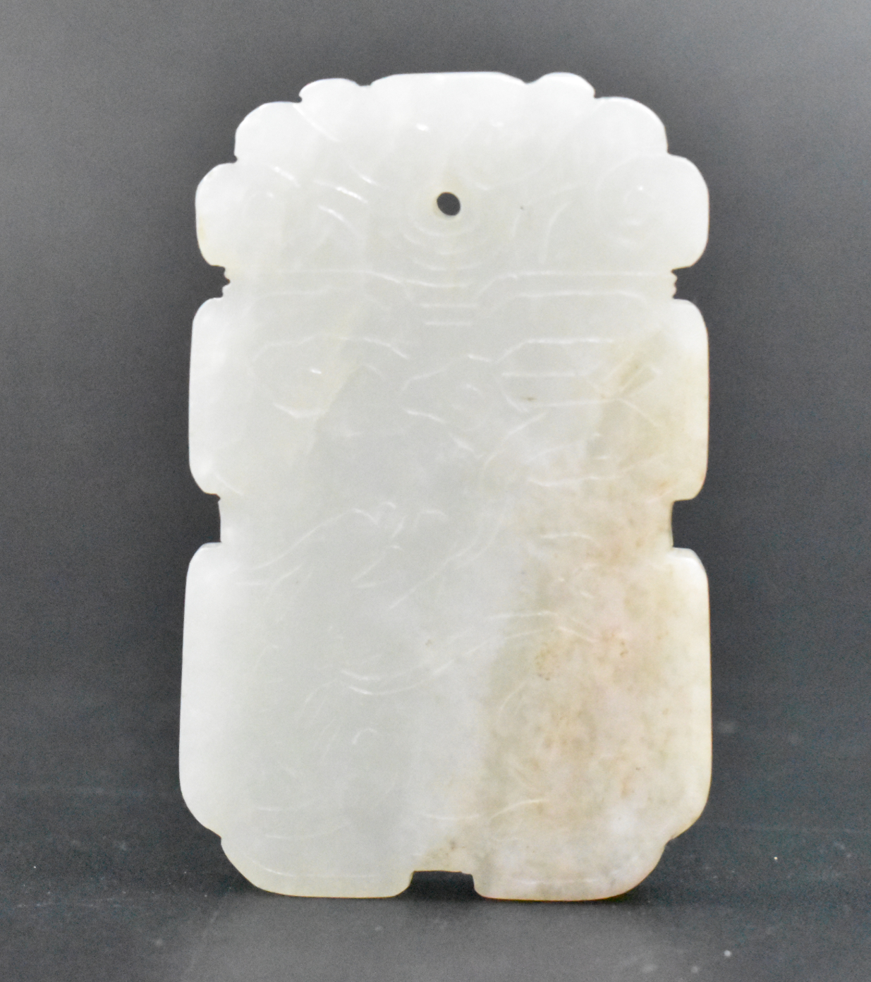 Appraisal: A Chinese jade carved plaque with Kirin design dating from