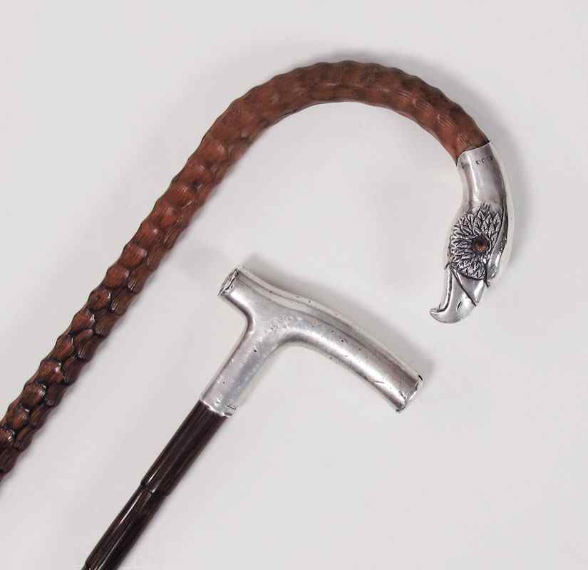 Appraisal: ENGLISH SILVER HANDLE WALKING STICKS To include London figural eagle