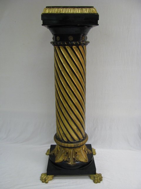 Appraisal: Carved wood spiral pedestal with claw feet painted gilt gold