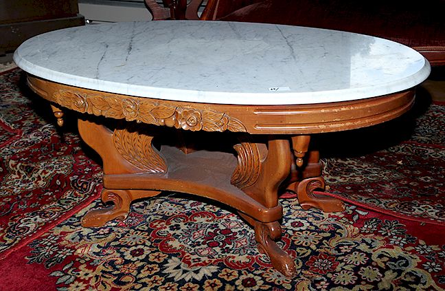 Appraisal: Victorian Style Coffee Table An earlier th century rose carved