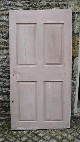 Appraisal: An th Century pine door set four rectangular moulded panels