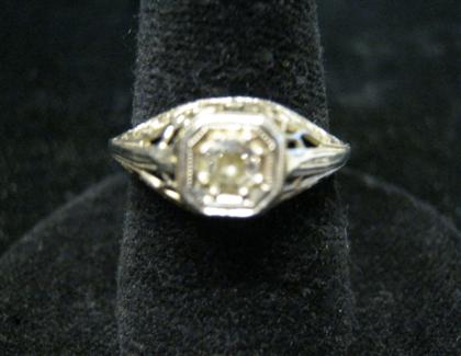 Appraisal: karat white gold and diamond filigree ringRound cut diamond approximately