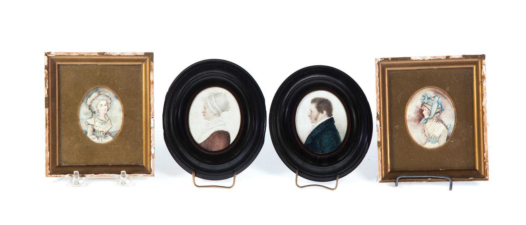 Appraisal: FOUR MINIATURE OVAL PORTRAITS European th century Man and woman