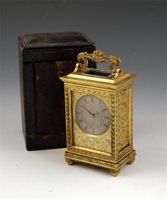 Appraisal: A mid th century English gilt brass carriage timepiece Hunt