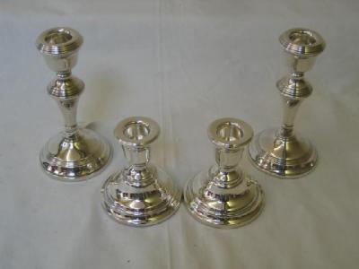 Appraisal: A PAIR OF CANDLESTICKS of low circular form with reeded