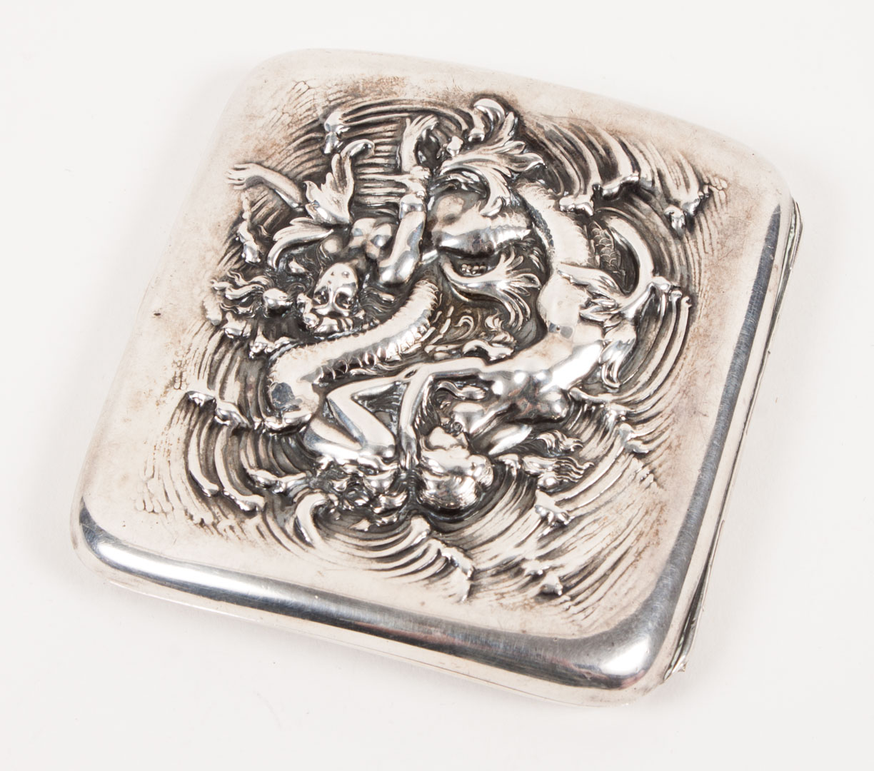 Appraisal: Sterling silver cigarette case no maker with embossed erotic mermaid