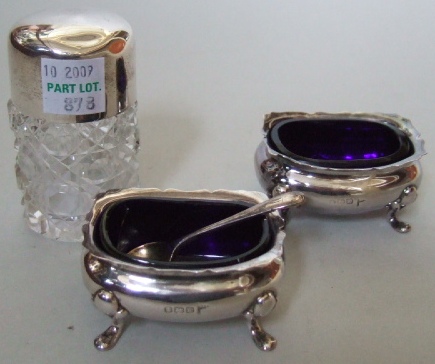 Appraisal: A pair of silver salts with shaped rims each raised