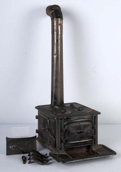 Appraisal: Cast Iron Child's Stove Description With three legs and all