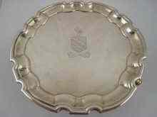 Appraisal: A small Georgian silver salver with Chippendale rim by John