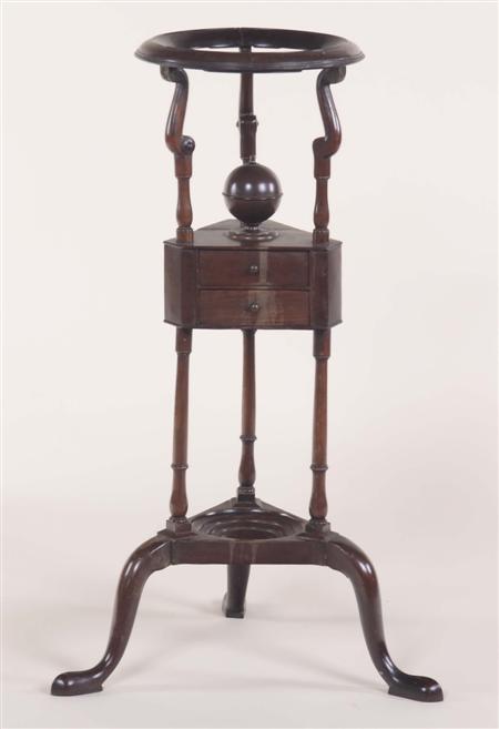 Appraisal: An early th century mahogany framed wig stand the moulded