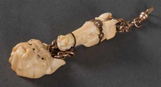 Appraisal: Antique carved ivory and gold-filled watch fob bearing a miniature