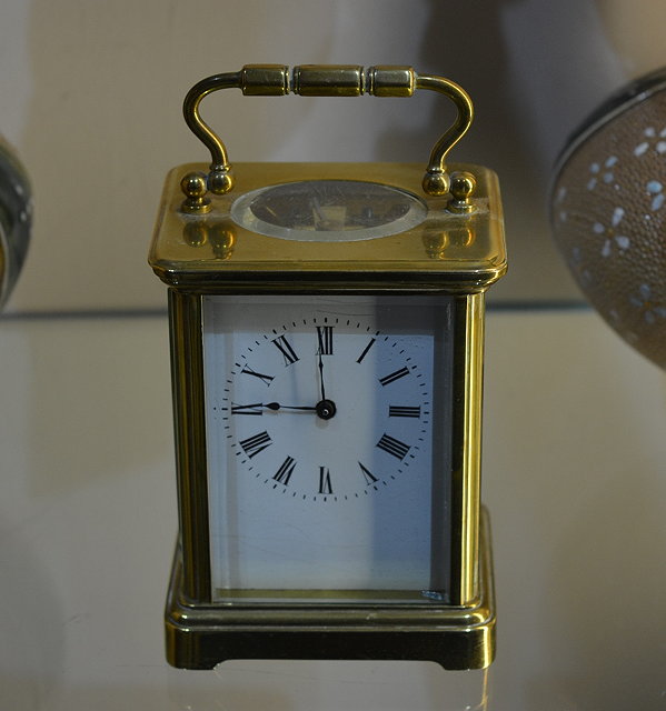 Appraisal: A French brass and enamel carriage timepiece