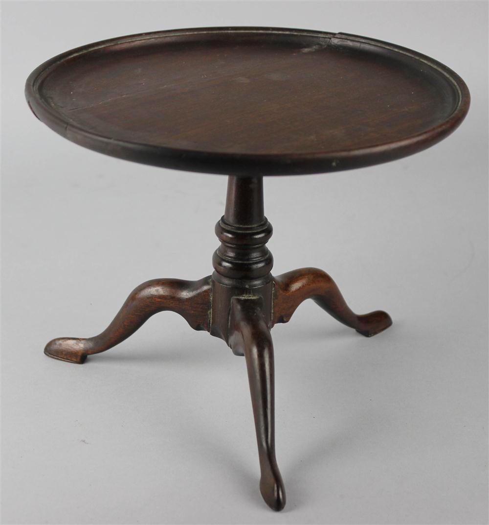 Appraisal: GEORGIAN MAHOGANY MINIATURE DISH TOP TABLE the miniature tilt top