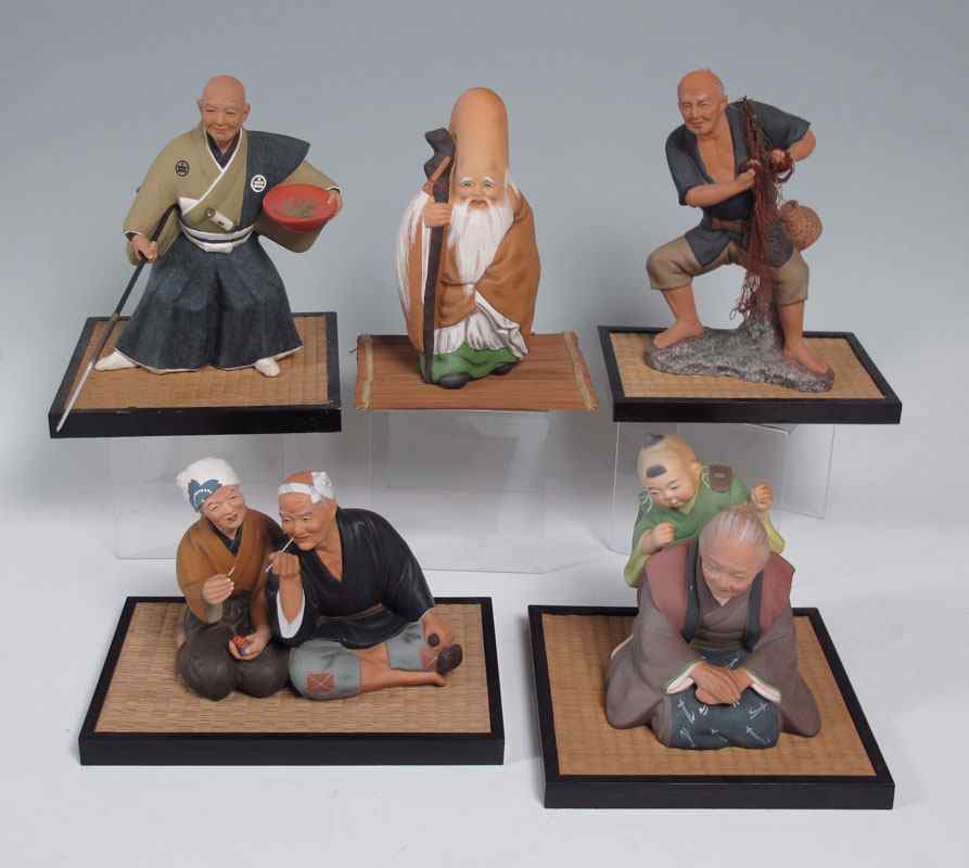 Appraisal: PIECE JAPANESE HAKATA DOLLS To include Elderly couple man smoking