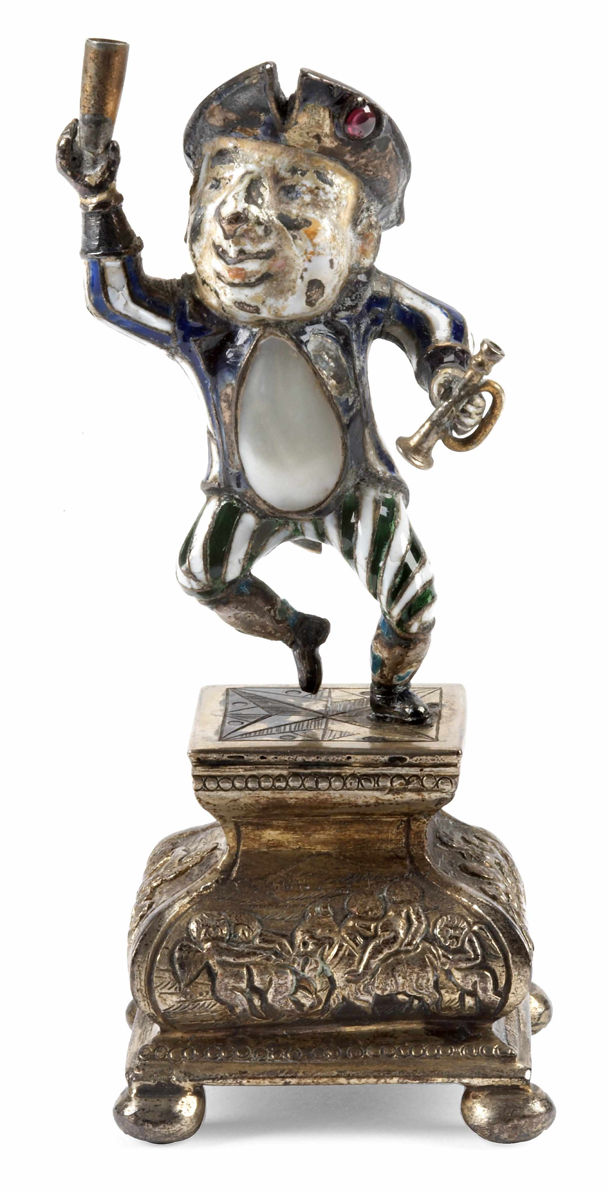 Appraisal: A Continental enamel and mother of pearl comic figure on