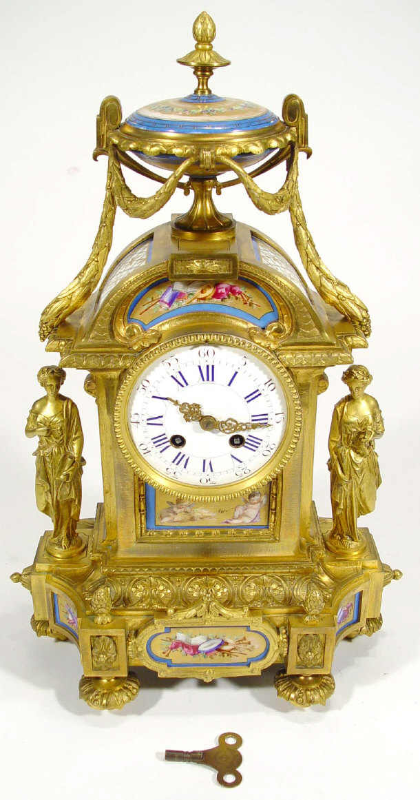 Appraisal: th Century gilt metal mantel clock mounted with Sevres style