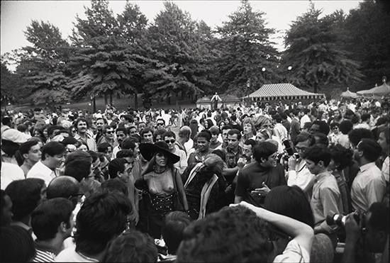 Appraisal: WINOGRAND GARRY - Untitled topless woman in crowd Silver print