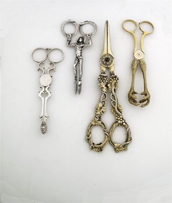 Appraisal: A cast pair of Victorian silvergilt grape shears pierced vine