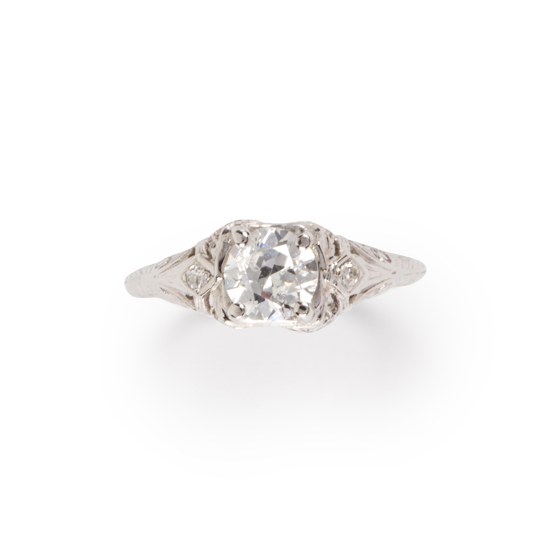 Appraisal: A DIAMOND AND FOURTEEN KARAT WHITE GOLD RING A diamond