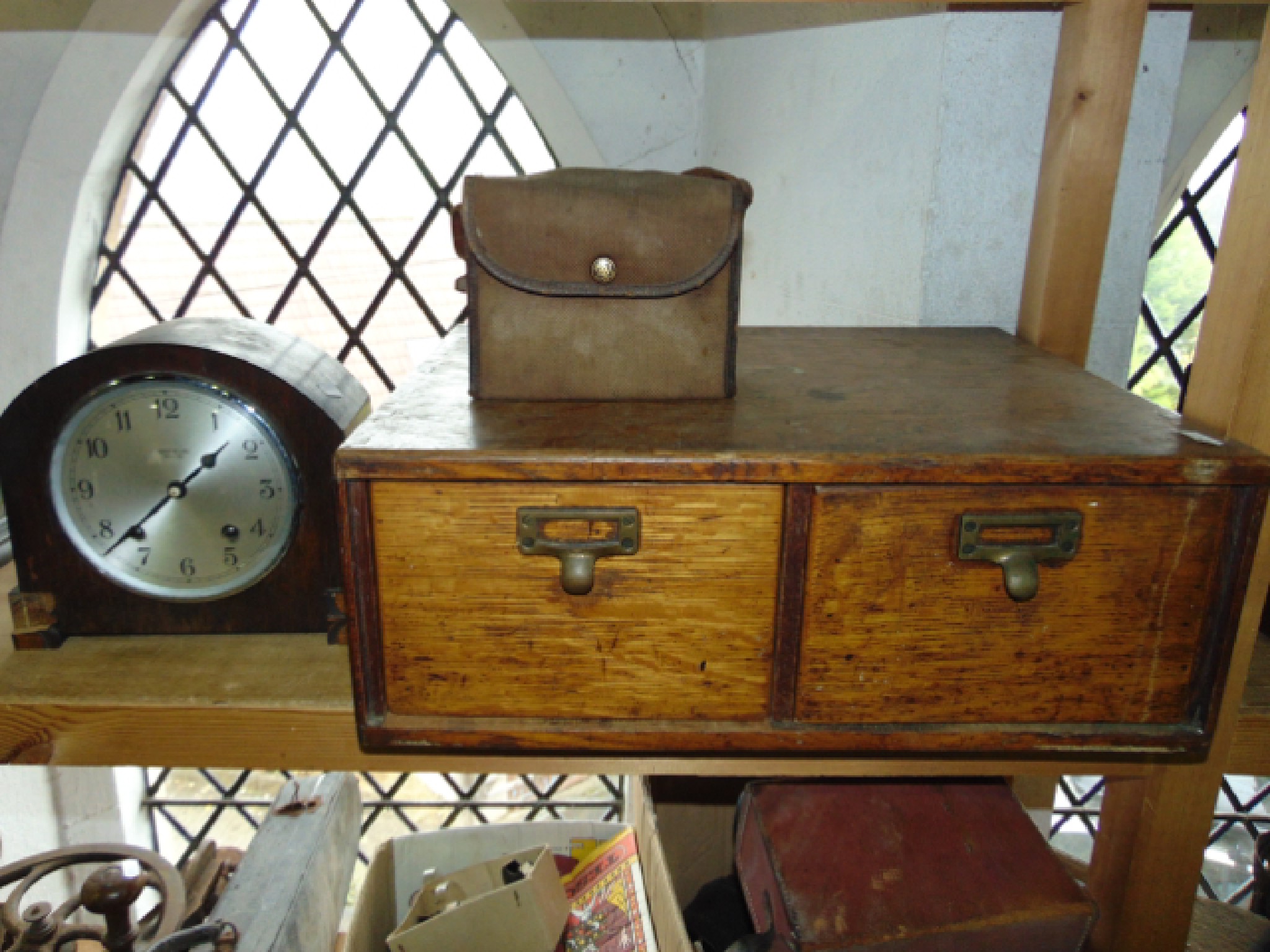 Appraisal: A two divisional oak bank of desk drawers with applied