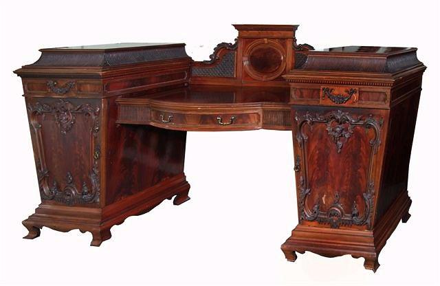 Appraisal: A LARGE MAPLE CO MAHOGANY PEDESTAL SIDE BOARD the central