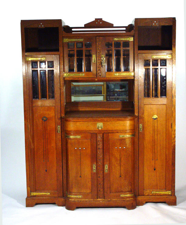 Appraisal: Large French Art Nouveau oak wall cabinet fitted a pair