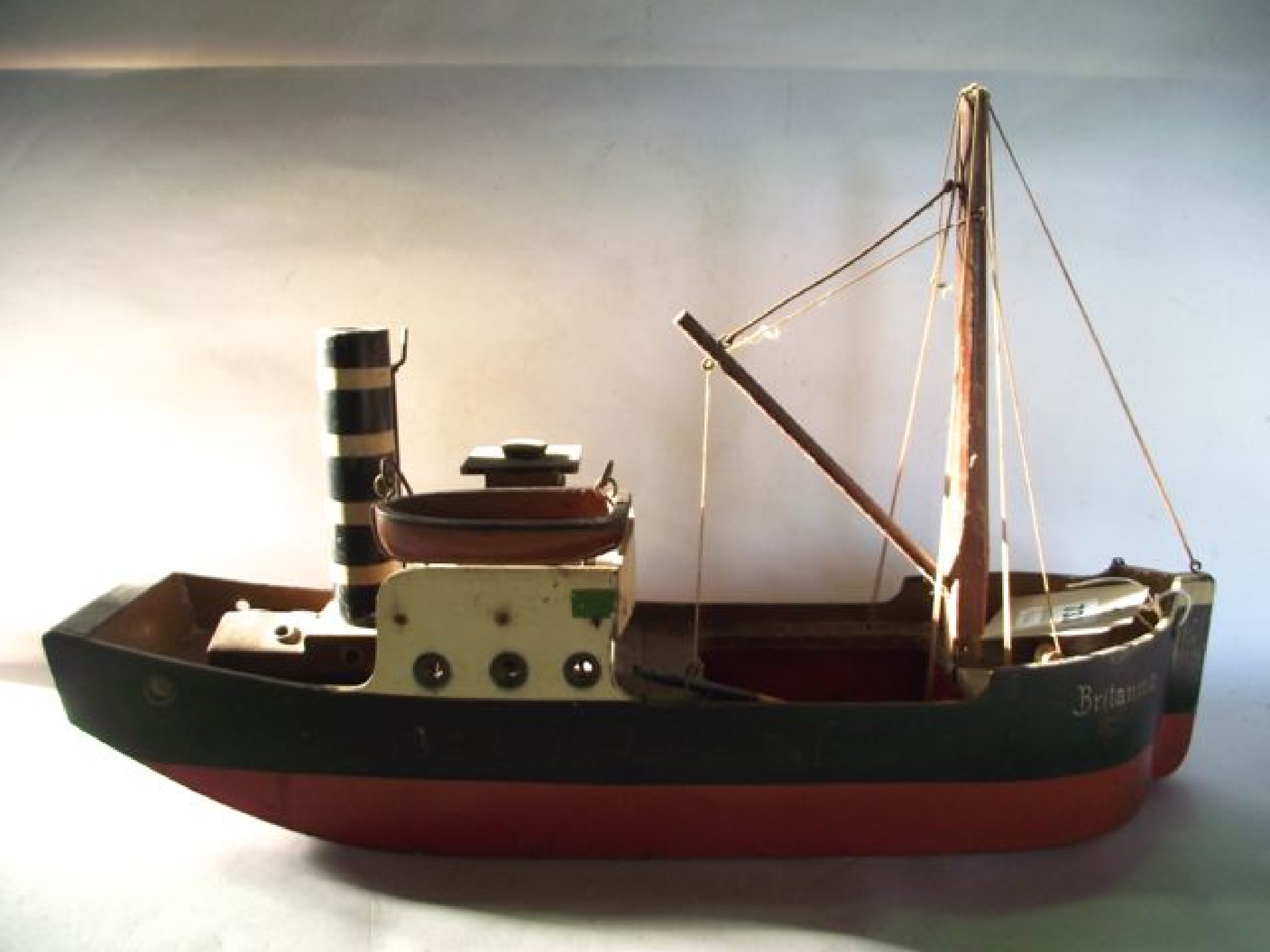 Appraisal: A vintage painted timber model boat - The Britannia marked