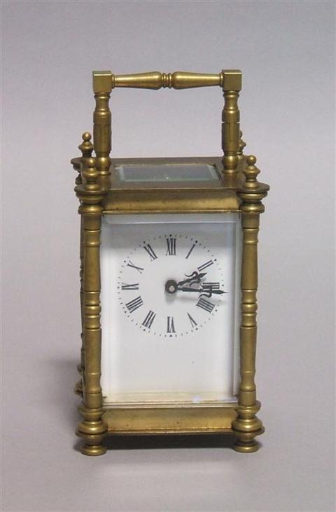 Appraisal: FRENCH BRASS AND GLASS CARRIAGE CLOCK Rectangular with bail handle