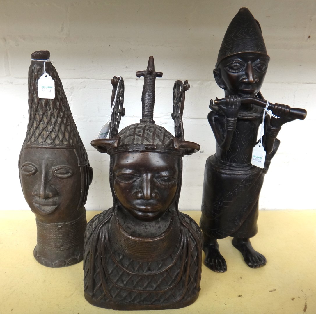 Appraisal: Two modern Bunin style African bronze busts and a similar