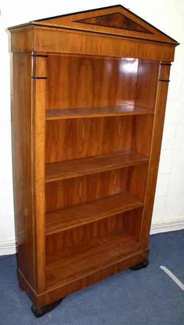 Appraisal: A BIEDEMIER STYLE WALNUT OPEN FRONT BOOKCASE fitted three shelves