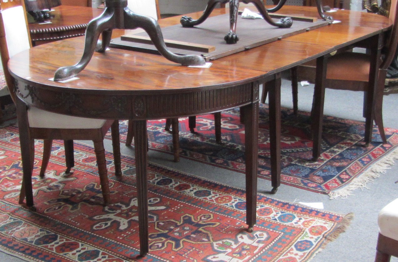 Appraisal: A George III mahogany 'D' end dining table with carved