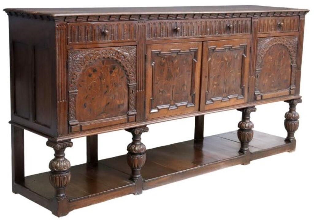 Appraisal: English Jacobean style oak sideboard th c rectangular top three