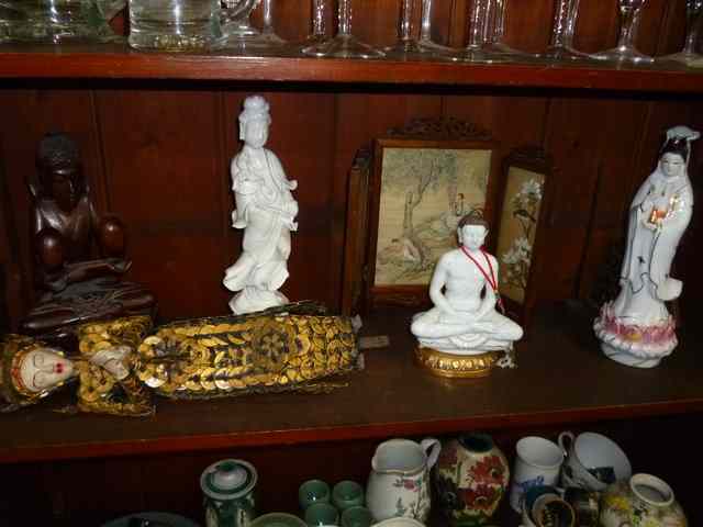 Appraisal: A ROSENTHAL PORCELAIN FIGURE OF A SEATED BUDDHA together with