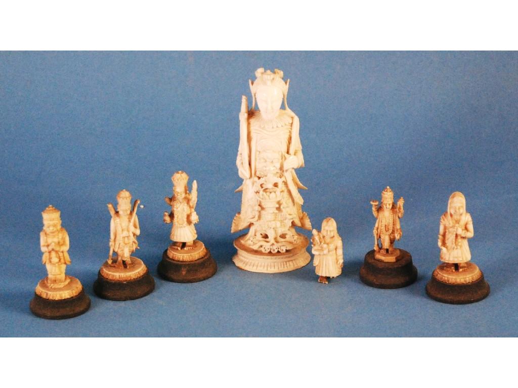 Appraisal: CHINESE CARVED IVORY FIGURAL CHESS PIECE modelled in ceremonial robes