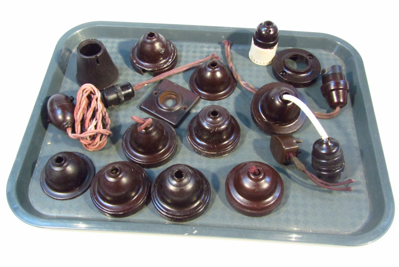 Appraisal: Various early thC dark brown Bakelite lamp fittings cm high