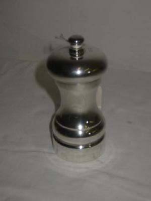 Appraisal: A PEPPER GRINDER of turned baluster form with turned finial